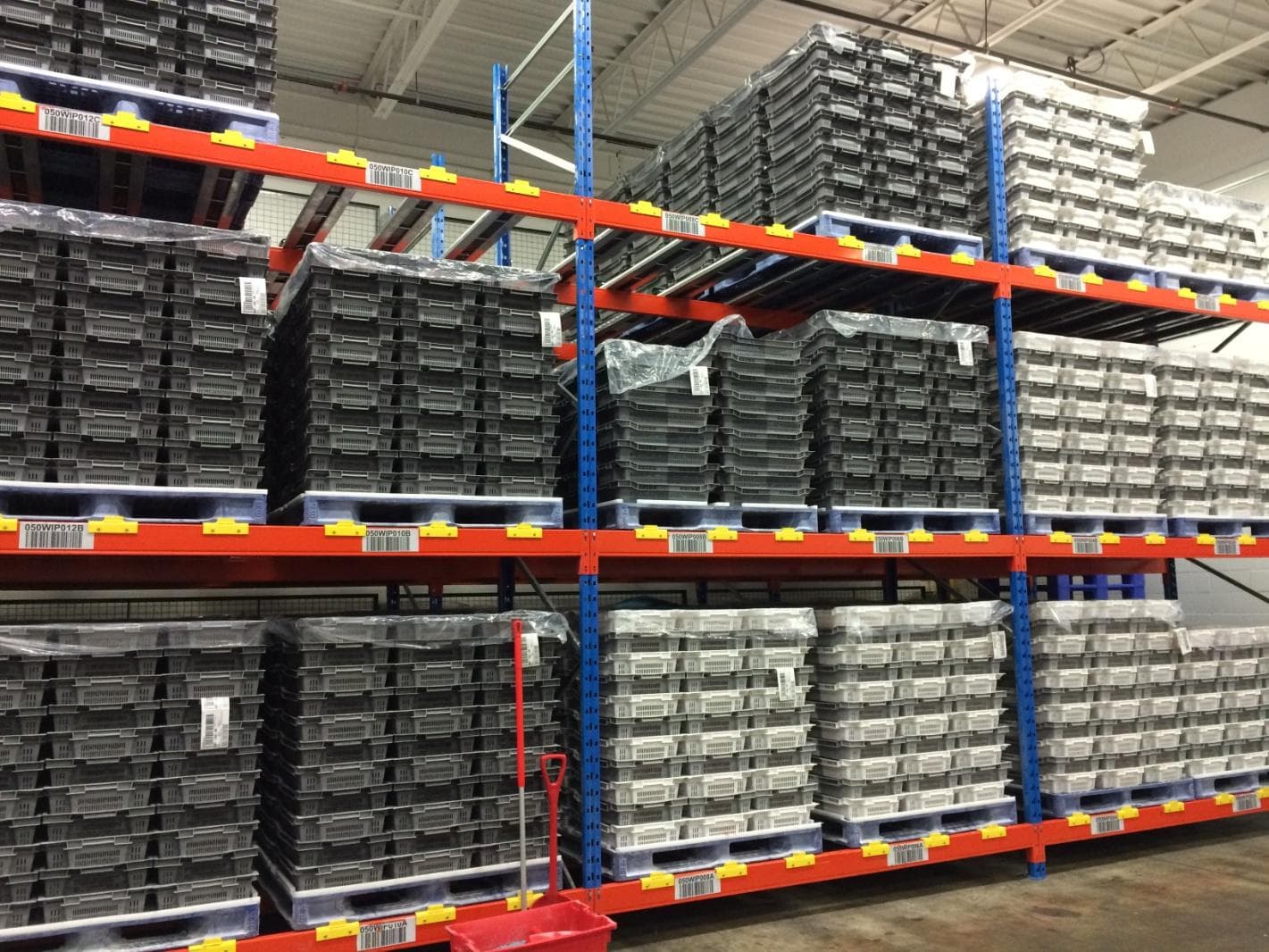 Plastic pallets stored on Spring Rail
